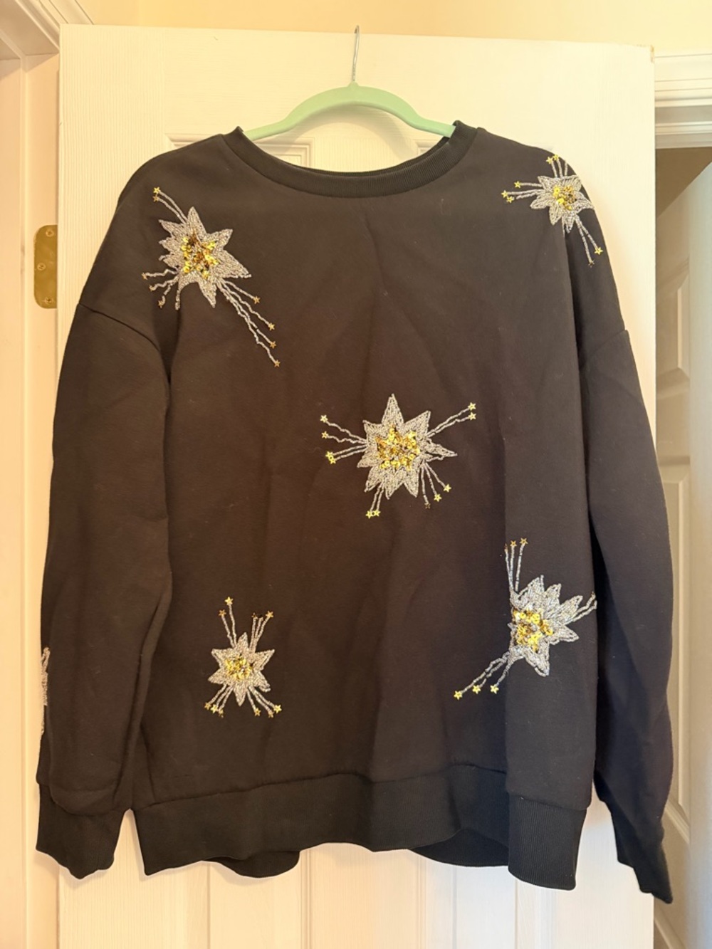 Anthropologie Black Sweatshirt with Silver & Gold Starburst Embroidery